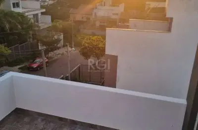 Casa com 3 quartos à venda na Rua Cônego Aleixo, 61, Guarujá, Porto Alegre