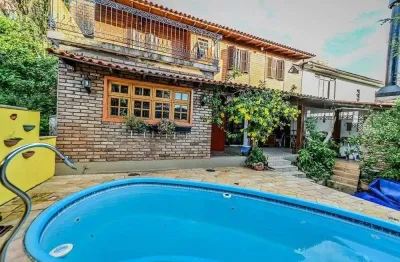 Casa em condomínio fechado com 4 quartos à venda na Das Figueiras, 108, Santa Tereza, Porto Alegre