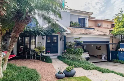 Casa de 4 dormitórios em condomínio - 320 m² - 4 vagas de garagem