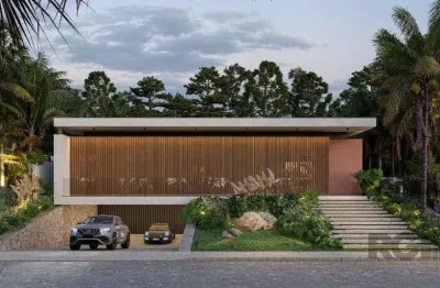 A casa conta com 434m2 de área construída, mas com um aproveitamento total dos 1.012m2 do lote