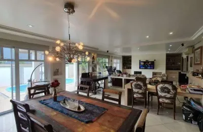 Casa em condomínio fechado com 5 quartos à venda na Rua Attílio Bilibio, 120, Jardim Carvalho, Porto Alegre