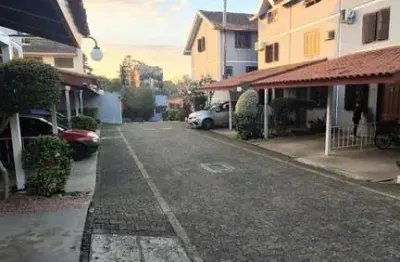 Casa com 2 dormitórios, 1 vaga, na av. otto niemeyer, bairro camaquã, poa, rs