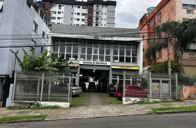 Prédio comercial a venda com pé direito duplo e estacionamento, bairro cristo redentor, porto alegre, rs