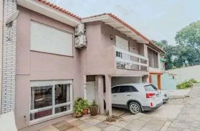 Casa em condomínio no bairro santo antômnio de 4 dormitórios e 2 vagas