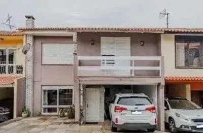 Casa em condomínio no bairro santo antômnio de 4 dormitórios e 2 vagas