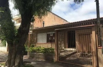 Casa com 3 quartos à venda na Rua Menezes Paredes, 110, Nonoai, Porto Alegre
