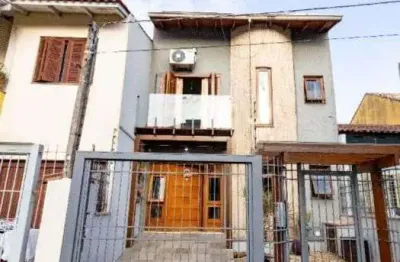 Casa com 3 quartos à venda na Rua Romano Rolando Botin, 155, Hípica, Porto Alegre