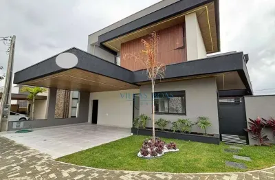 Casa com 4 dormitórios à venda, 246 m² por r$ 2.397.000,00 - condomínio aruana - são josé dos campos/sp