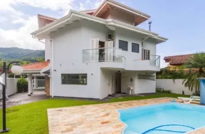 Casa com 4 dormitórios à venda, 350 m² por r$ 6.900.000,00 - tabatinga - caraguatatuba/sp