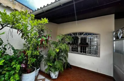 Casa com 2 dormitórios à venda, 100 m² por R$ 550.000,00 - Caiçara - Praia Grande/SP
