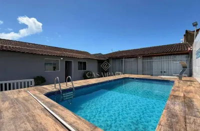 Casa com 3 dormitórios à venda, 360 m² por R$ 970.000,00 - Tude Bastos - Praia Grande/SP