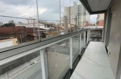 Sobrado em condomínio com 3 suítes à venda, 122 m² por r$ 750.000 - vila guilhermina - praia grande/sp