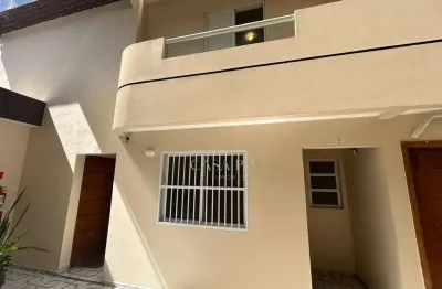 Sobrado em condomínio fechado com 2 dormitórios à venda, 73 m² por r$ 308.000 - tude bastos - praia grande/sp