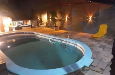 Sobrado com piscina e 3 dormitórios à venda, 240 m² por r$ 780.000 - maracanã - praia grande/sp