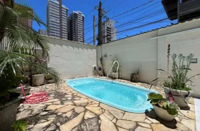 Sobrado com 4 dormitórios e piscina à venda, 173 m² por r$ 1.800.000 - canto do forte - praia grande/sp
