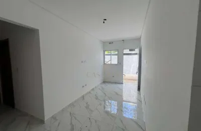 Casa em condomínio com 2 dormitórios à venda, 59 m² por r$ 350.000 - tude bastos - praia grande/sp