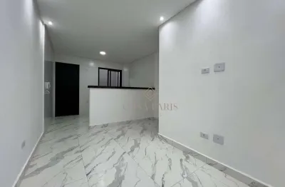 Sobrado com 2 dormitórios à venda, 49 m² por r$ 330.000 - maracanã - praia grande/sp