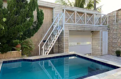Casa com piscina e 3 dormitórios à venda, 128 m² por r$ 1.200.000 - solemar - praia grande/sp