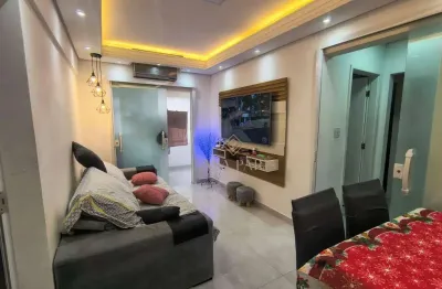 Apartamento com 2 dormitórios à venda, 58 m² por R$ 325.000 - Tupi - Praia Grande/SP