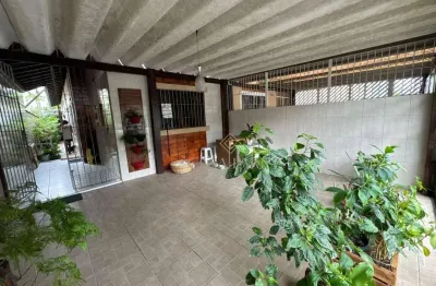 Casa com 2 dormitórios à venda, 94 m² por R$ 420.000,00 - Mirim - Praia Grande/SP