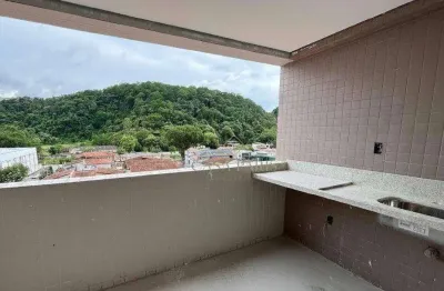 Apartamento com 2 dormitórios à venda, 72 m² por R$ 650.000,00 - Canto do Forte - Praia Grande/SP