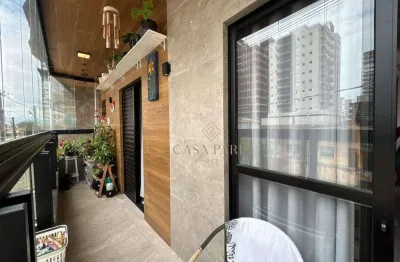 Casa sobreposta com 3 dormitórios à venda, 101 m² por R$ 610.000 - Vila Guilhermina - Praia Grande/SP