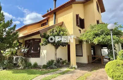 Casa em condomínio fechado de alto padrão à venda no bairro marechal rondon, canoas. projeto pensado para quem prioriza espaço, conforto e lazer priva