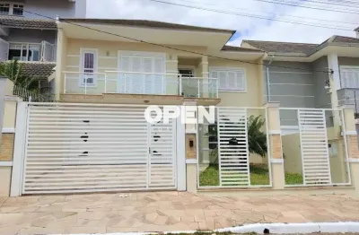 Sobrado de 4 dormitórios com suíte para locação no bairro moinhos de vento em canoas