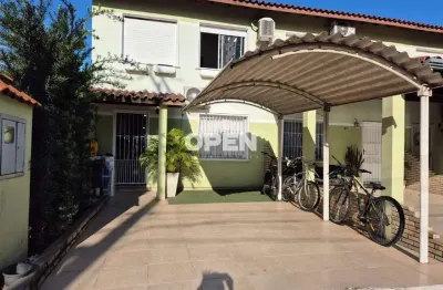 Casa em condomínio fechado com 3 quartos à venda na Rua Henrique Stefani, 801, Igara, Canoas por R$ 480.000