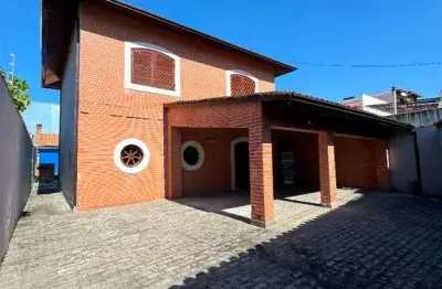 Casa com 4 dormitórios, 259 m² - venda por R$ 1.200.000,00 ou aluguel por R$ 7.000,00/mês - Centro - Caraguatatuba/SP