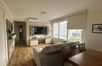 Apartamento semimobiliado 2 dormitórios sendo 1 suíte e box duplo no villagio