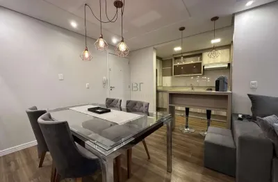 Apartamento semimobiliado 2 dormitórios 1 suíte e box duplo no cinquentenário