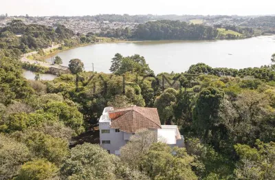 Casa charmosa abraçada pela natureza no parque passaúna - 5 dormitórios - 454 m²