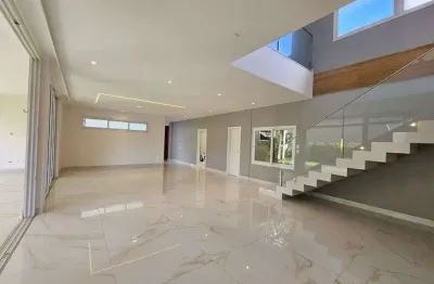 Casa com 5 suítes em ponta negra- condomínio flora boulevard