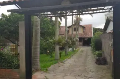 Sobrado com ar de serra com 240m² e terreno 11x72 no centro de esteio.