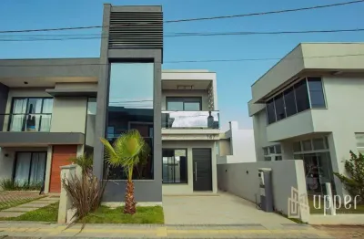 Casa com 3 dormitórios à venda, 137 m² por r$ 950.000,00 - condomínio primavera - gravataí/rs