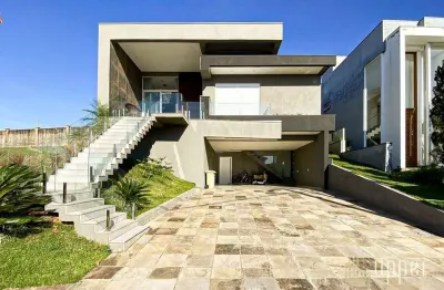 Casa com 4 dormitórios à venda, 252 m² por r$ 2.490.000,00 - alphaville - gravataí/rs