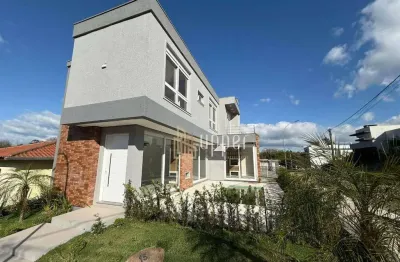 Casa com 3 dormitórios à venda, 202 m² por r$ 1.380.000 - villa lucchesi - gravataí/rs