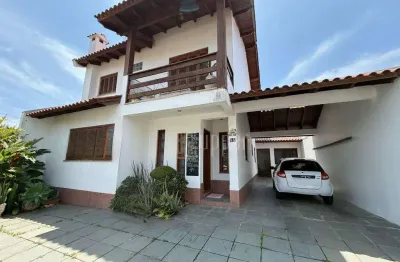 Casa com 5 dormitórios à venda, 263 m² por R$ 1.590.000,00 - Salgado Filho - Gravataí/RS