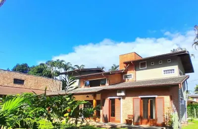 Casa em condomínio fechado com 5 quartos à venda na praia do itamambuca, ubatuba  por r$ 2.690.000