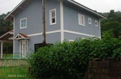 Casa em condomínio fechado com 2 quartos à venda em Horto Florestal, Ubatuba  por R$ 2.000.000