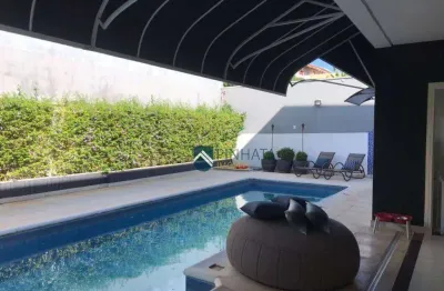 Casa com 3 dormitórios à venda, 302 m² por r$ 1.850.000,00 - condomínio residencial terras do caribe - valinhos/sp