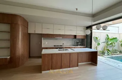 Casa térrea com design minimalista e sofisticado no condomínio viena