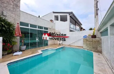 Casa de 3 quartos à venda em peruíbe-sp, parque balneário oasis! 140,00 m², 4 banheiros e 2 vagas de garagem piscina