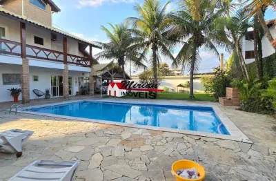 Sobrado a venda em peruibe proximo ao centro com 720m2 4 dormitórios e piscina ideal para morar