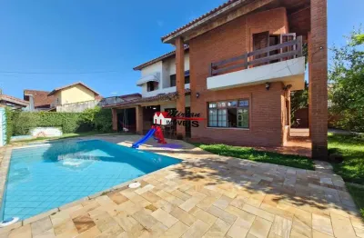 Casa em 2 lotes, com piscina a apenas 600 metros da praia em um dos bairros mais nobres de peruíbe