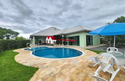 Sobrado alto padrão em condomínio fechado em peruibe, 4 suites, com salão de jogos , piscina