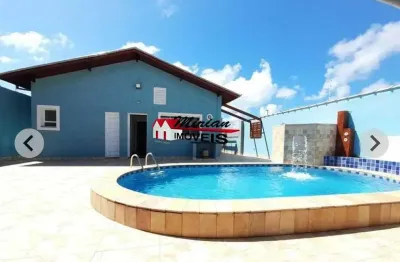 Casa térrea próxima ao mar com 4 dormitórios  com piscina  em bairro nobre