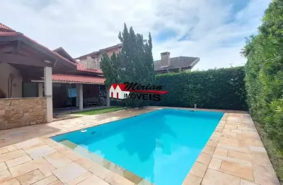 Casa em condomínio fechado em peruíbe com piscina 4 dormitórios sendo 2 suites, bougainvillee ii