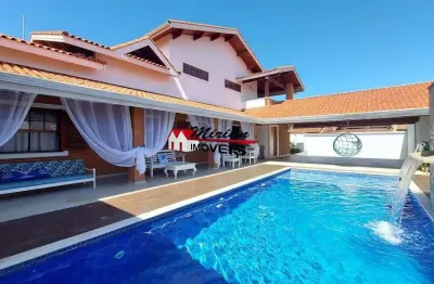 Sobrado a venda em peruibe com 4 dormitórios sendo 2 suites, 2 lotes  piscina 100 metros da praia em peruibe